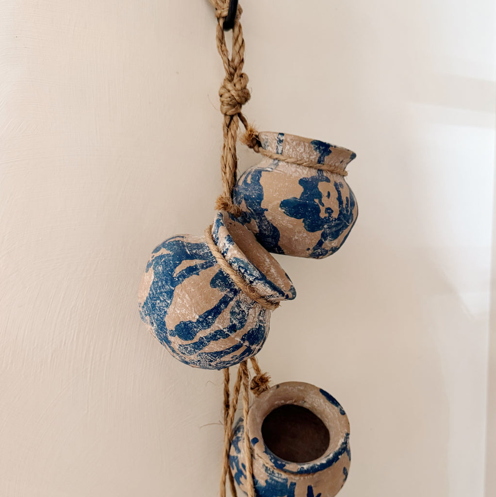 String of Handmade Pots