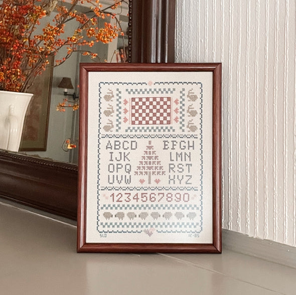Framed Cross-Stitched Holiday Sampler